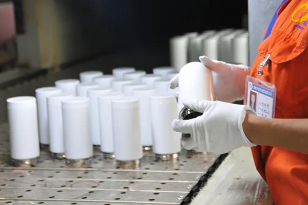 Precision hydraulic pressing of stainless steel water bottle bodies - metal cup manufacturing workshop